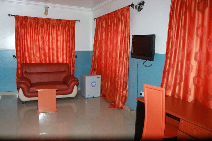 Imagen de la habitación del Hotel L and L Executives and Suites. Foto 11