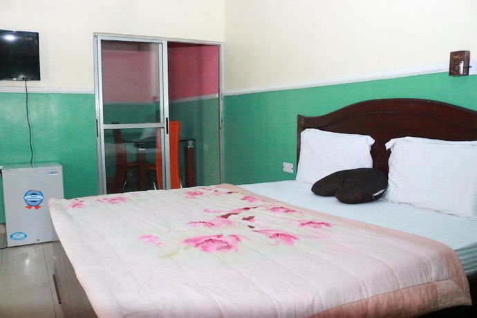 Imagen de la habitación del Hotel L and L Executives and Suites. Foto 13