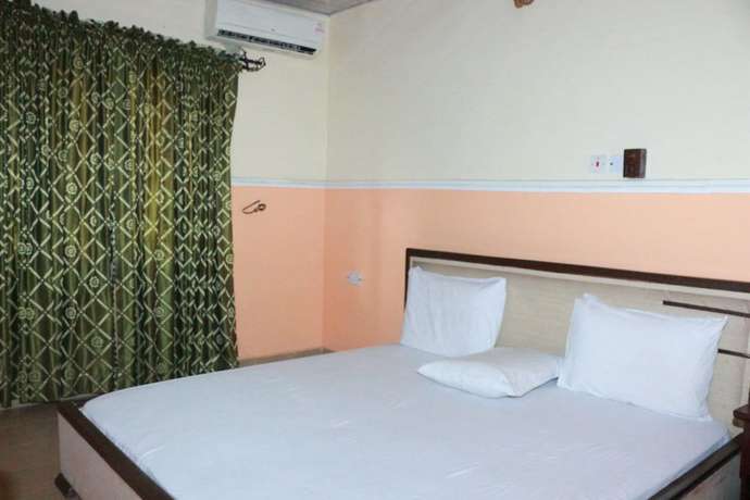 Imagen de la habitación del Hotel L and L Executives and Suites. Foto 16