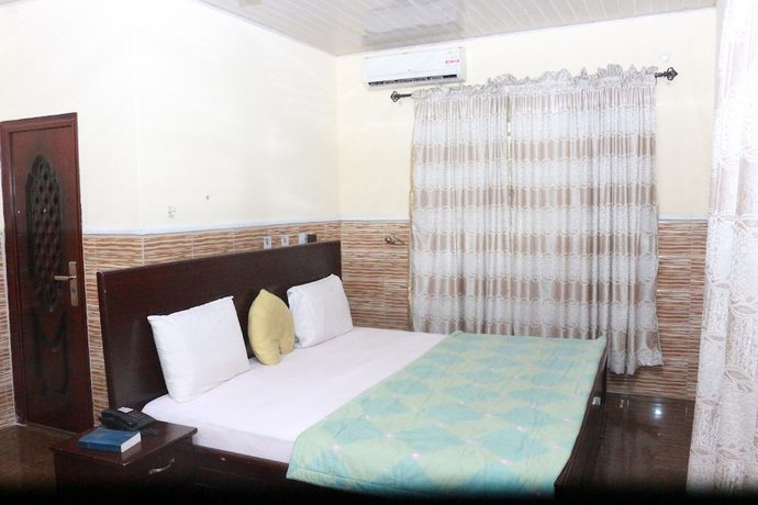 Imagen de la habitación del Hotel L and L Executives and Suites. Foto 17