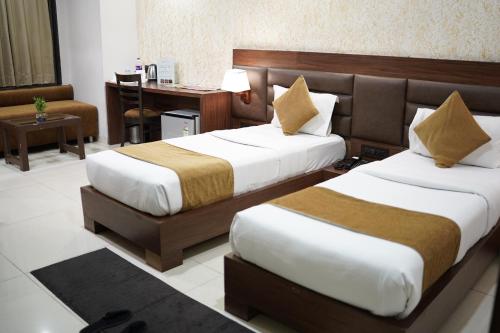 Imagen de la habitación del Hotel LA PEARL, Bhopal. Foto 18