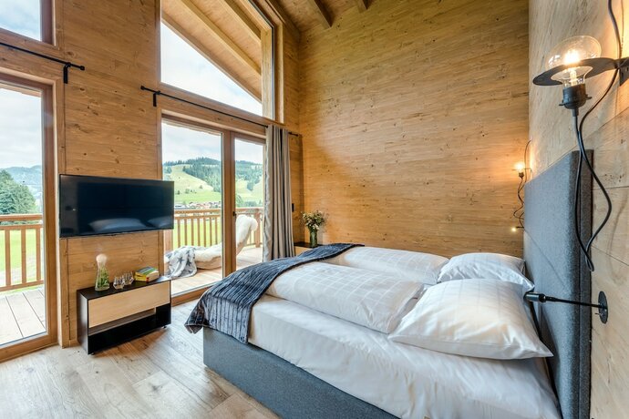 Imagen de la habitación del Hotel LA SOA Chalets and Eventlodge. Foto 20