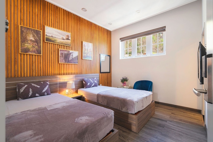 Imagen de la habitación del Hotel LACLE DALAT. Foto 8