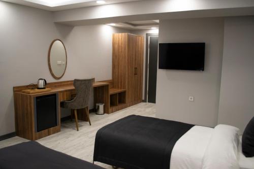 Imagen de la habitación del Hotel LAGOM OTEL. Foto 18