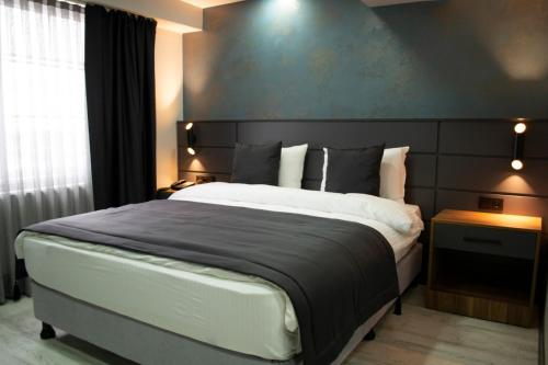Imagen de la habitación del Hotel LAGOM OTEL. Foto 19