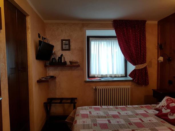 Imagen de la habitación del Hotel L'ANCIEN PAQUIER. Foto 8