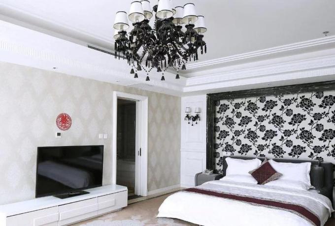 Imagen de la habitación del Hotel LANDI FASHION PARK. Foto 7