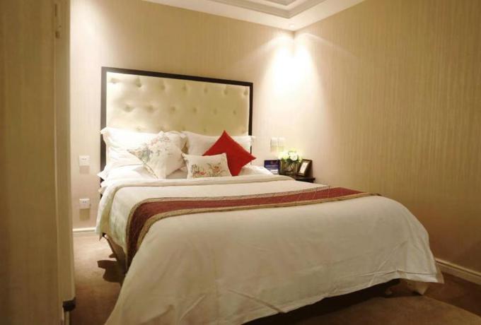 Imagen de la habitación del Hotel LANDI FASHION PARK. Foto 8