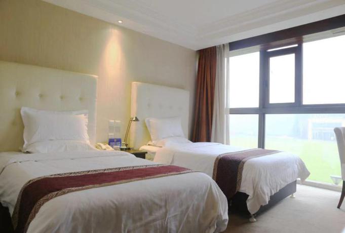 Imagen de la habitación del Hotel LANDI FASHION PARK. Foto 10