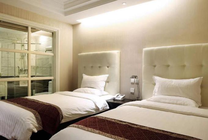 Imagen de la habitación del Hotel LANDI FASHION PARK. Foto 11
