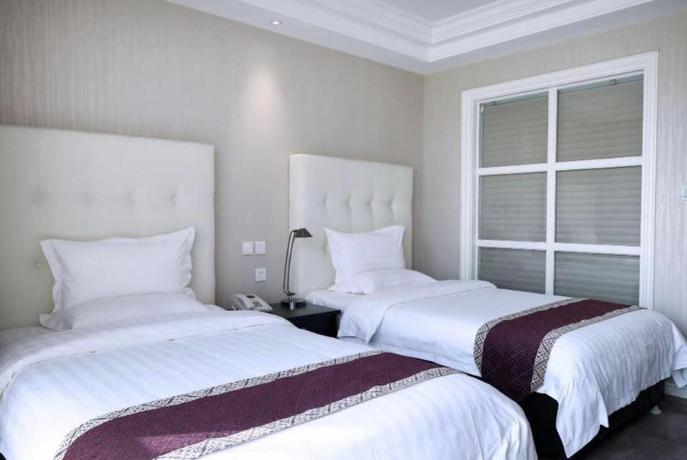 Imagen de la habitación del Hotel LANDI FASHION PARK. Foto 12