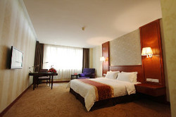Imagen de la habitación del Hotel LAO DI FANG. Foto 8
