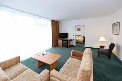 Imagen de la habitación del Hotel LAT & Apartmenthaus Berlin. Foto 18