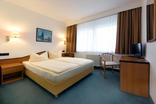 Imagen de la habitación del Hotel LAT & Apartmenthaus Berlin. Foto 19