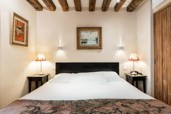 Imagen de la habitación del Hotel L'Absinthe. Foto 16