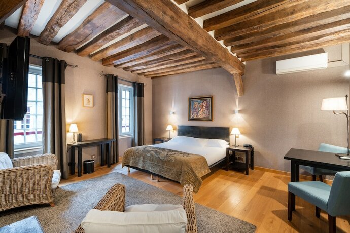 Imagen de la habitación del Hotel L'Absinthe. Foto 18