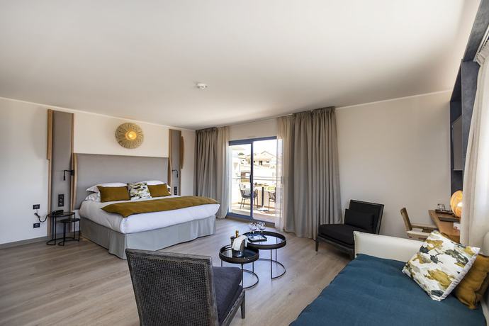 Imagen de la habitación del Hotel L'Acquale. Foto 8