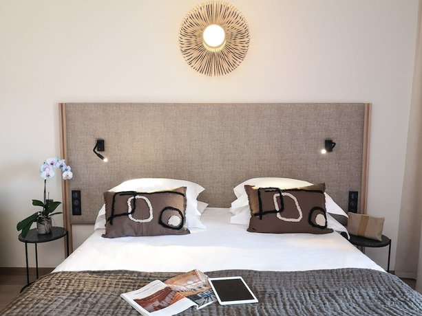 Imagen de la habitación del Hotel L'Acquale. Foto 10