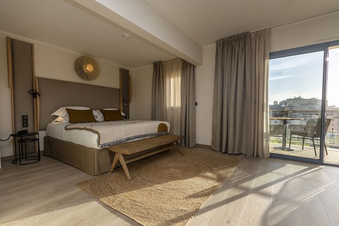 Imagen de la habitación del Hotel L'Acquale. Foto 18