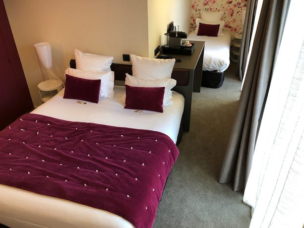 Imagen de la habitación del Hotel L'Adresse, Saint Malo. Foto 18
