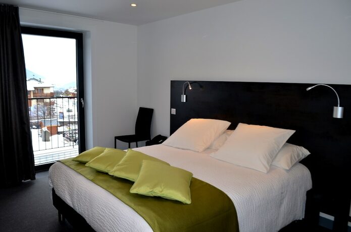 Imagen de la habitación del Hotel L\'Alpin. Foto 19