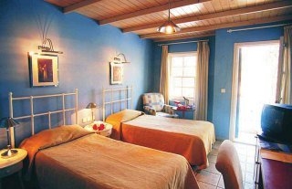 Imagen de la habitación del Hotel L'Ambiance. Foto 3