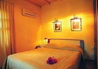 Imagen de la habitación del Hotel L'Ambiance. Foto 5