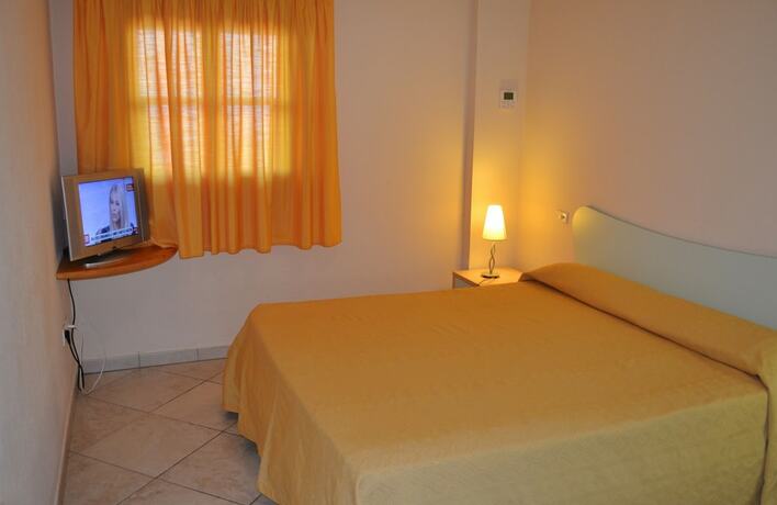 Imagen de la habitación del Hotel L\'Arcobaleno Resort. Foto 17