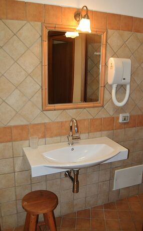 Imagen de la habitación del Hotel L\'Arcobaleno Resort. Foto 20