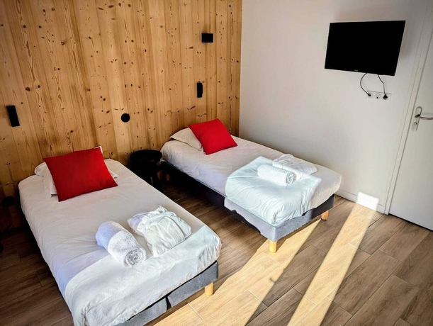 Imagen de la habitación del Hotel L\'Auberge Ensoleill&eacute;e. Foto 2