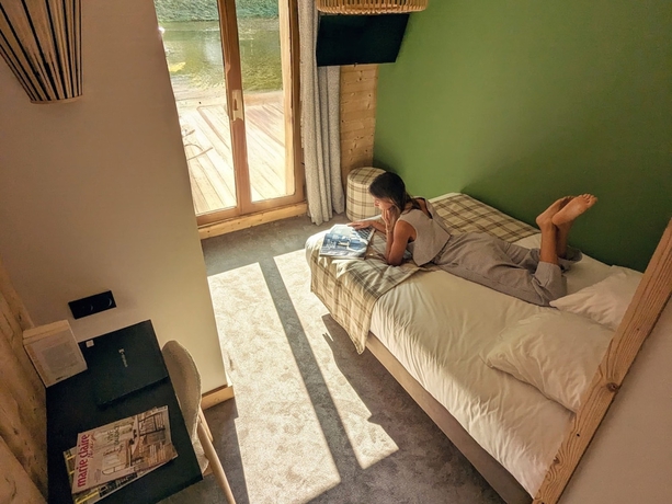 Imagen de la habitación del Hotel L\'Auberge Ensoleill&eacute;e. Foto 5