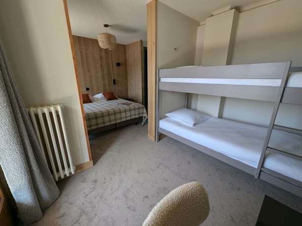 Imagen de la habitación del Hotel L\'Auberge Ensoleill&eacute;e. Foto 7