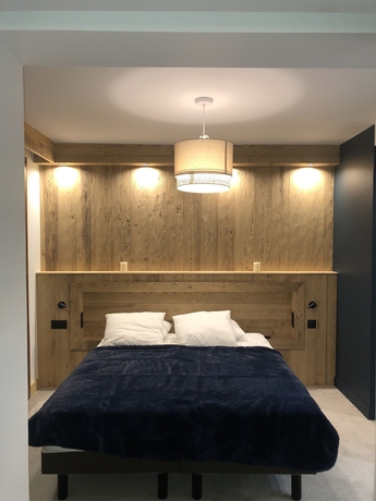 Imagen de la habitación del Hotel L\'Auberge Ensoleill&eacute;e. Foto 8