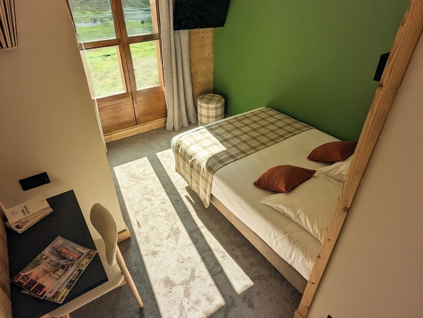 Imagen de la habitación del Hotel L\'Auberge Ensoleill&eacute;e. Foto 11