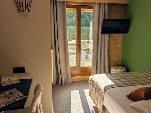 Imagen de la habitación del Hotel L\'Auberge Ensoleill&eacute;e. Foto 12