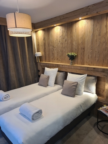 Imagen de la habitación del Hotel L\'Auberge Ensoleill&eacute;e. Foto 15