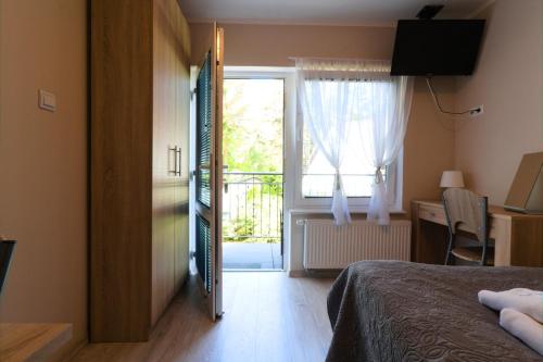 Imagen de la habitación del Hotel LC pokoje and apartamenty. Foto 7