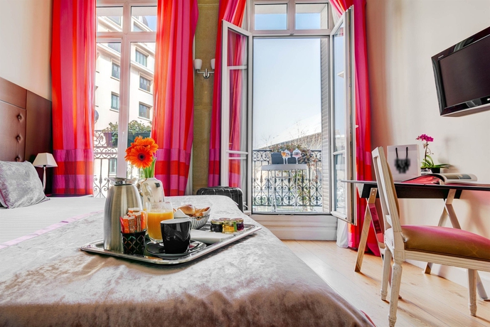 Imagen de la habitación del Hotel LE 123 ELYSEES. Foto 4