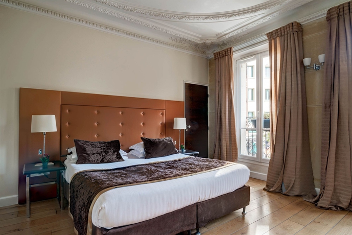 Imagen de la habitación del Hotel LE 123 ELYSEES. Foto 7