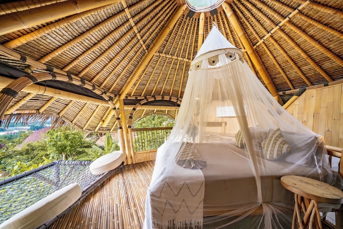 Imagen de la habitación del Hotel LE BAMBOO BALI. Foto 2