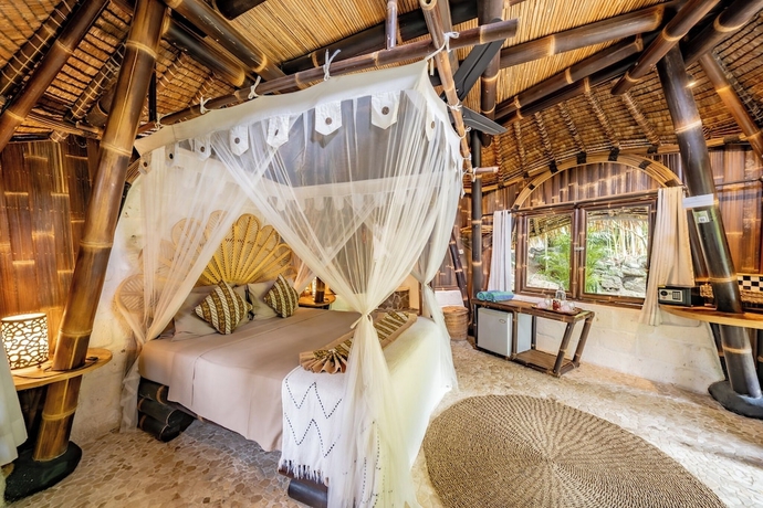 Imagen de la habitación del Hotel LE BAMBOO BALI. Foto 8