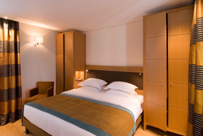 Imagen de la habitación del Hotel LE SIX HOTEL. Foto 11