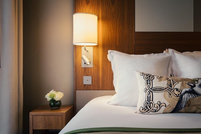 Imagen de la habitación del Hotel LE TOURVILLE PARIS. Foto 12