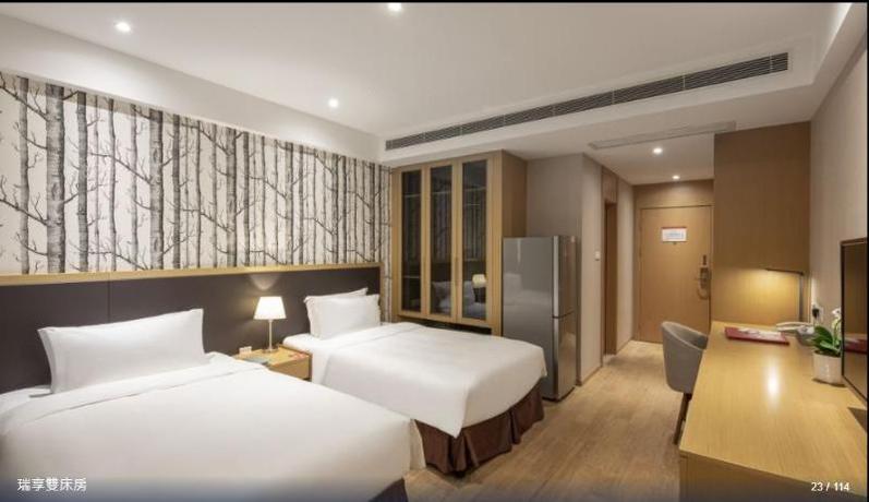 Imagen de la habitación del Hotel LEJIAHUI SUISSE PLACE APARTMENT HOTEL. Foto 4