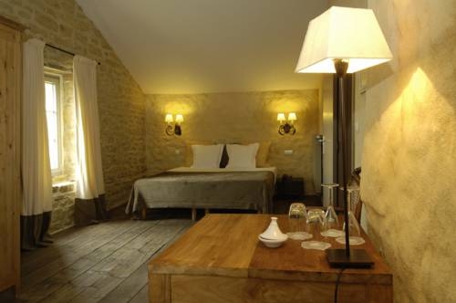 Imagen de la habitación del Hotel L'EMPREINTE DU TEMPS. Foto 15