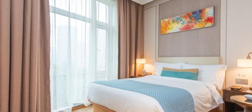 Imagen de la habitación del Hotel LEON HOTEL (TIANZIFANG). Foto 7