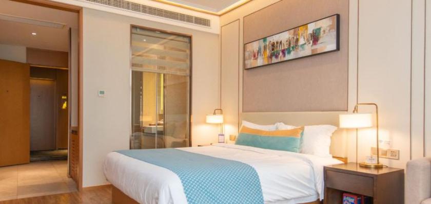Imagen de la habitación del Hotel LEON HOTEL (TIANZIFANG). Foto 10