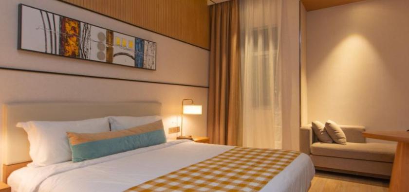 Imagen de la habitación del Hotel LEON HOTEL (TIANZIFANG). Foto 13