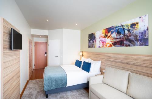 Imagen de la habitación del Hotel LEONARDO SALZBURG AIRPORT. Foto 16