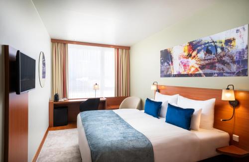 Imagen de la habitación del Hotel LEONARDO SALZBURG AIRPORT. Foto 17